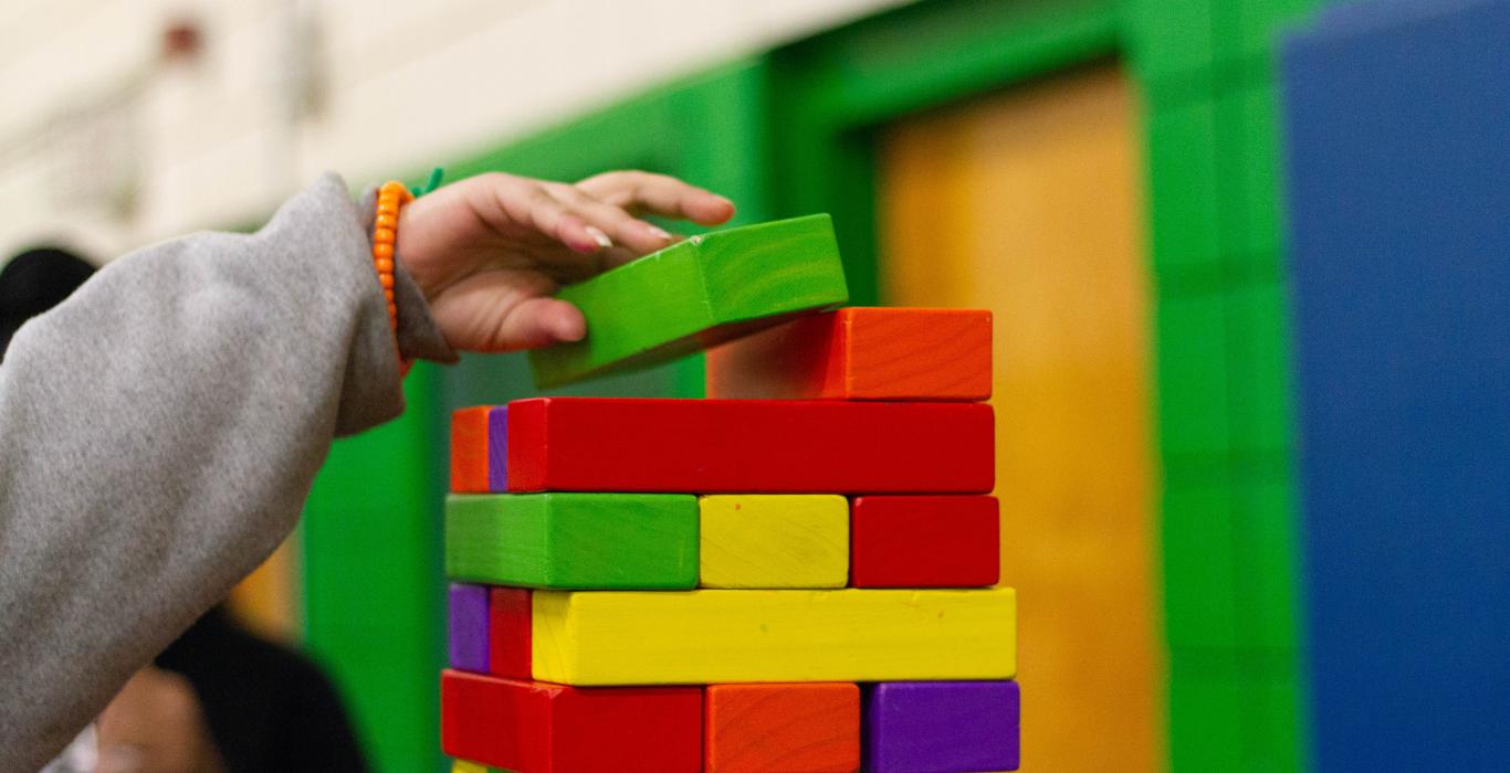 Colourful blocks being stacked