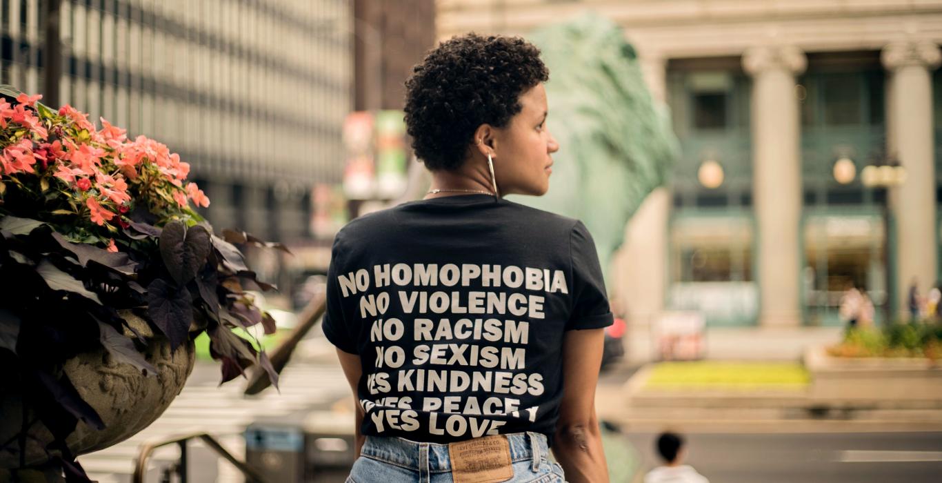 woman in black t-shirt with text