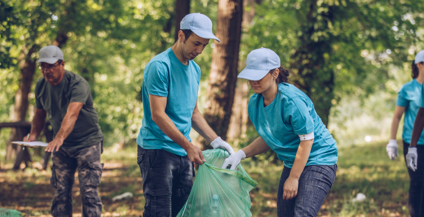 volunteers cleaning up a park