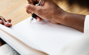 writing in notebook